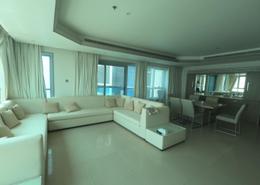 Living / Dining Room image for: Apartment - 2 bedrooms - 2 bathrooms for rent in Corniche Tower - Ajman Corniche Road - Ajman, Image 1