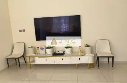 Living Room image for: Villa - 3 Bedrooms - 4 Bathrooms for rent in Zinnia - The Roots DAMAC Hills 2 - Damac Hills 2 - Dubai, Image 1
