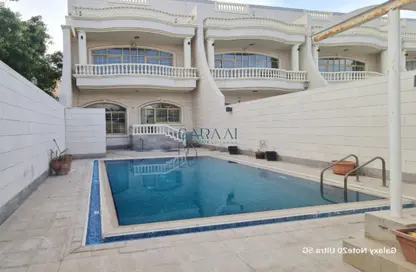 Pool image for: Villa - 7 Bedrooms for rent in Mohamed Bin Zayed City Villas - Mohamed Bin Zayed City - Abu Dhabi, Image 1