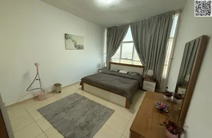 Apartment - 2 Bedrooms - 2 Bathrooms for sale in Orient Tower 1 - Orient Towers - Al Bustan - Ajman