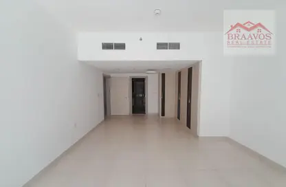 Empty Room image for: Apartment - 1 Bedroom - 2 Bathrooms for rent in Al Manal Elite - Jumeirah Village Circle - Dubai, Image 1