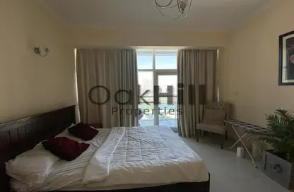 Room / Bedroom image for: Apartment - 1 Bathroom for rent in Oasis Tower 1 - Dubai Sports City - Dubai, Image 1