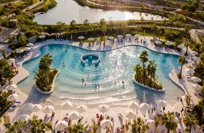 Pool image for: Apartment - 1 Bedroom - 1 Bathroom for sale in Golf Gate 2 - DAMAC Hills - Dubai, Image 1