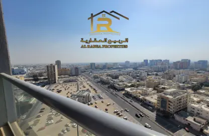 Balcony image for: Apartment - 1 Bedroom - 1 Bathroom for sale in Nuaimia One Tower - Al Nuaimiya - Ajman, Image 1