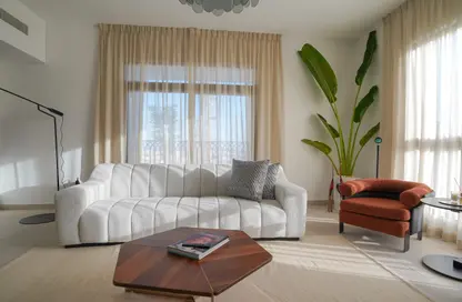 Living Room image for: Apartment - 2 Bedrooms - 2 Bathrooms for rent in Asayel - Madinat Jumeirah Living - Umm Suqeim - Dubai, Image 1