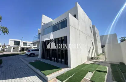 Outdoor Building image for: Villa - 6 Bedrooms - 7 Bathrooms for sale in Janusia - The Roots DAMAC Hills 2 - Damac Hills 2 - Dubai, Image 1