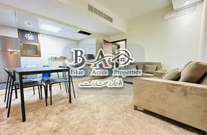 Living / Dining Room image for: Apartment - 1 Bedroom - 1 Bathroom for rent in East Corniche road - Hamdan Street - Abu Dhabi, Image 1
