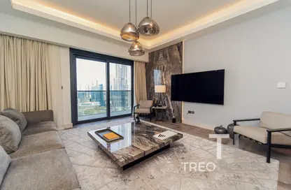 Living Room image for: Apartment - 3 Bedrooms - 3 Bathrooms for sale in Act Towers - Opera District - Downtown Dubai - Dubai, Image 1