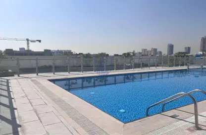 Pool image for: Apartment - 1 Bedroom - 2 Bathrooms for rent in Sydney Tower - Jumeirah Village Circle - Dubai, Image 1