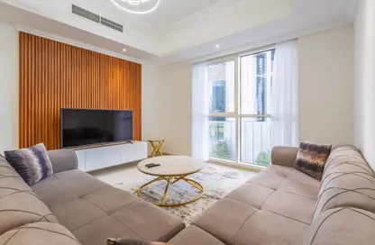 Living Room image for: Apartment - 1 Bedroom - 2 Bathrooms for sale in Dunya Tower - Burj Khalifa Area - Downtown Dubai - Dubai, Image 1