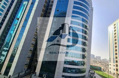 شقة - غرفة نوم - 2 حمامات للايجار في أورينت تاور 1 - أورينت تاور - البستان - عجمان