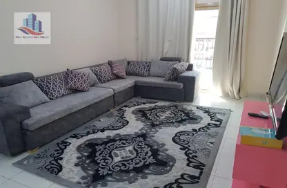 Living Room image for: Apartment - 2 Bedrooms - 2 Bathrooms for rent in New Al Taawun Road - Al Taawun - Sharjah, Image 1