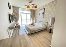 Room / Bedroom image for: Studio - 1 bathroom for rent in Bloom Towers B - Bloom Towers - Jumeirah Village Circle - Dubai, Image 1