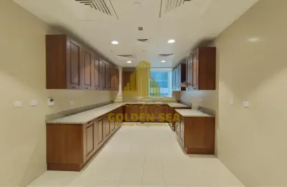 Kitchen image for: Apartment - 2 Bedrooms - 4 Bathrooms for rent in Corniche Residence - Corniche Road - Abu Dhabi, Image 1