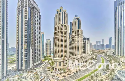 Outdoor Building image for: Apartment - 3 Bedrooms - 4 Bathrooms for sale in Boulevard Crescent 1 - BLVD Crescent - Downtown Dubai - Dubai, Image 1