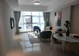 Living / Dining Room image for: Apartment - 1 bedroom - 2 bathrooms for sale in Gulfa Towers - Al Rashidiya 1 - Al Rashidiya - Ajman, Image 1