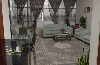 شقة - غرفة نوم - 2 حمامات للبيع في أورينت تاور 1 - أورينت تاور - البستان - عجمان