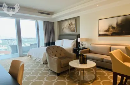 Living Room image for: Apartment - 1 Bathroom for rent in Kempinski BLVD - Downtown Dubai - Dubai, Image 1