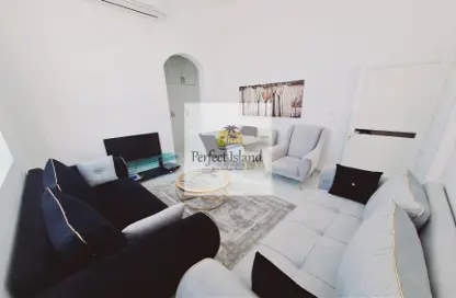 Living Room image for: Apartment - 1 Bedroom - 1 Bathroom for rent in Baniyas East - Baniyas - Abu Dhabi, Image 1