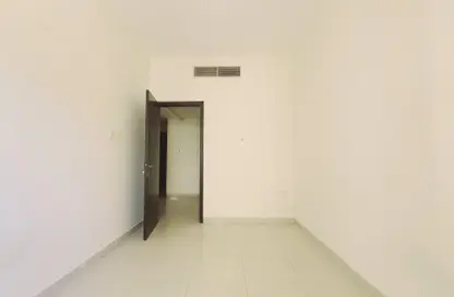 Empty Room image for: Apartment - 2 Bedrooms - 1 Bathroom for rent in Muweileh Community - Muwaileh Commercial - Sharjah, Image 1