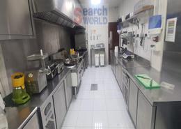 صورةمطبخ لـ: متجر - 1 حمام للبيع في شارع حمدان - أبوظبي, صورة 1
