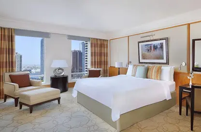 صورة لـ غرفة- غرفة النوم النزل و الشقق الفندقية - 3 غرف نوم - 4 حمامات للايجار في ريتز كارلتون - مركز دبي المالي العالمي - دبي ، صورة رقم 1