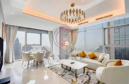 Living / Dining Room image for: Apartment - 2 Bedrooms - 3 Bathrooms for rent in Paramount Tower Hotel  and  Residences - Business Bay - Dubai, Image 1