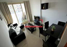 Living / Dining Room image for: Apartment - 1 bedroom - 2 bathrooms for rent in Dream Tower - Dubai Marina - Dubai, Image 1