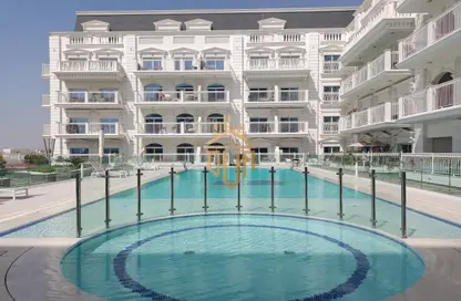 صورة لـ حوض سباحة شقة - 1 حمام للايجار في فينشيتوري بالاسيو - ارجان - دبي ، صورة رقم 1