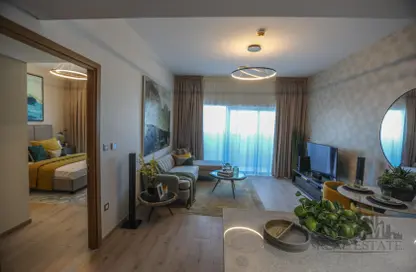 صورة لـ غرفة المعيشة شقة - 2 غرف نوم - 2 حمامات للبيع في عزيزي اورا - جبل علي - دبي ، صورة رقم 1