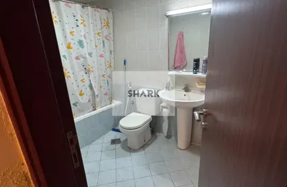 شقة - غرفة نوم - 2 حمامات للبيع في أورينت تاور 1 - أورينت تاور - البستان - عجمان