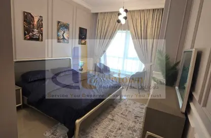 Apartment - 2 Bedrooms - 2 Bathrooms for sale in Corniche Tower - Ajman Corniche Road - Ajman
