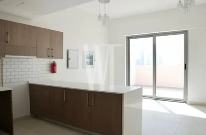 صورة لـ مطبخ شقة - غرفة نوم - 2 حمامات للايجار في كازا جراندي - قرية الجميرا سركل - دبي ، صورة رقم 1