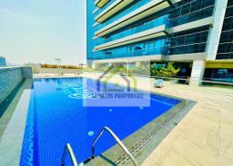 Pool image for: Apartment - 1 bedroom - 2 bathrooms for rent in Orchid Residence - Dubai Science Park - Dubai, Image 1