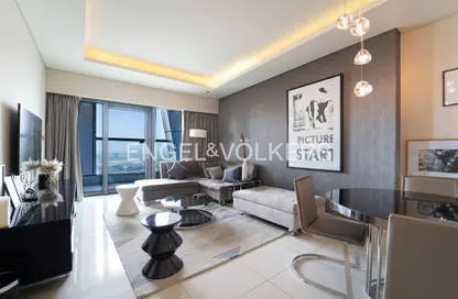 Living Room image for: Apartment - 1 Bedroom - 1 Bathroom for sale in Tower A - DAMAC Towers by Paramount - Business Bay - Dubai, Image 1