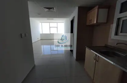 Kitchen image for: Apartment - 1 Bathroom for rent in Al Nahda Residential Complex - Al Nahda - Sharjah, Image 1