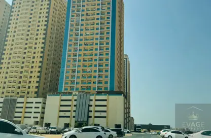 Apartment - 1 Bedroom - 1 Bathroom for sale in Paradise Lakes Towers - Emirates City - Ajman