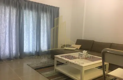 Living Room image for: Apartment - 1 Bedroom - 2 Bathrooms for sale in Al Reef Downtown - Al Reef - Abu Dhabi, Image 1