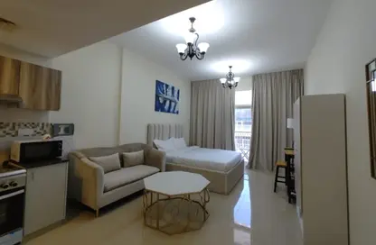 Apartment - Studio - 1 Bathroom for rent in Chaimaa Premiere - Jumeirah Village Circle - Dubai
