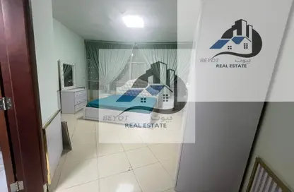 شقة - غرفة نوم - 2 حمامات للايجار في أورينت تاور 1 - أورينت تاور - البستان - عجمان