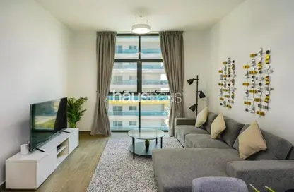 Living Room image for: Apartment - 1 Bedroom - 2 Bathrooms for rent in AKA Residence - Jumeirah Village Circle - Dubai, Image 1