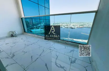 Apartment - 2 Bedrooms - 2 Bathrooms for sale in Oasis Tower 3 - Al Rashidiya 1 - Al Rashidiya - Ajman