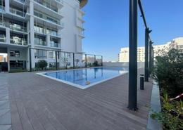 Pool image for: Apartment - 1 bedroom - 2 bathrooms for rent in Oasis Residences - Masdar City - Abu Dhabi, Image 1