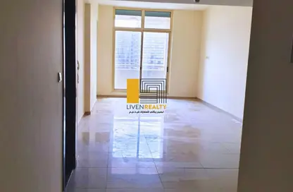 Empty Room image for: Apartment - 1 Bedroom - 2 Bathrooms for rent in Frankfurt Tower - Dubai Sports City - Dubai, Image 1