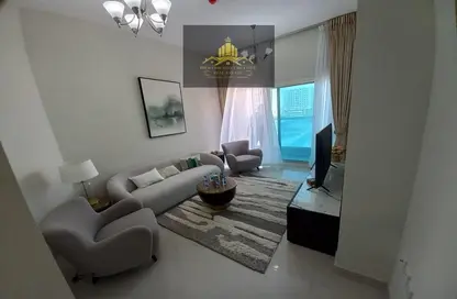 صورة لـ غرفة المعيشة شقة - 2 غرف نوم - 2 حمامات للبيع في مدينة الإمارات - عجمان ، صورة رقم 1