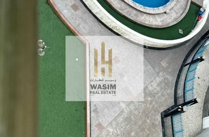 Apartment - 1 Bedroom - 2 Bathrooms for rent in Orient Tower 2 - Orient Towers - Al Bustan - Ajman