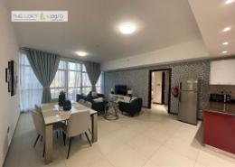 Living / Dining Room image for: Apartment - 2 bedrooms - 3 bathrooms for rent in Capital Centre - Abu Dhabi, Image 1