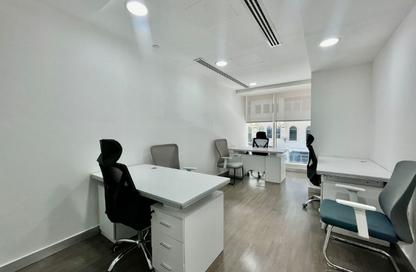 Office Space - Studio - 4 Bathrooms for rent in Hamdan Street - Abu Dhabi
