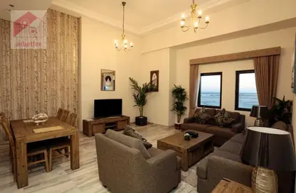 Living / Dining Room image for: Apartment - 2 Bedrooms - 2 Bathrooms for rent in Marbella Holiday Homes - Al Jaddaf - Dubai, Image 1