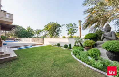 Garden image for: Villa - 5 Bedrooms - 6 Bathrooms for sale in Sector H - Emirates Hills - Dubai, Image 1